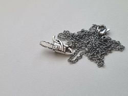 Halsband med motorsåg