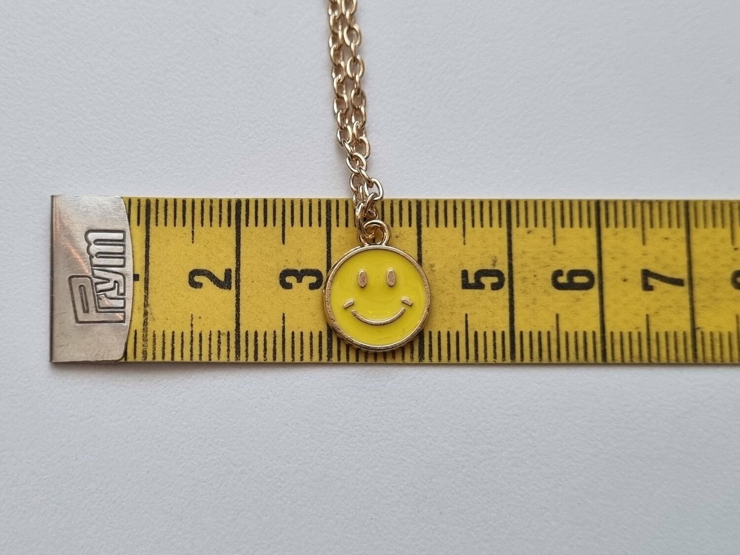 Halsband med gul smiley
