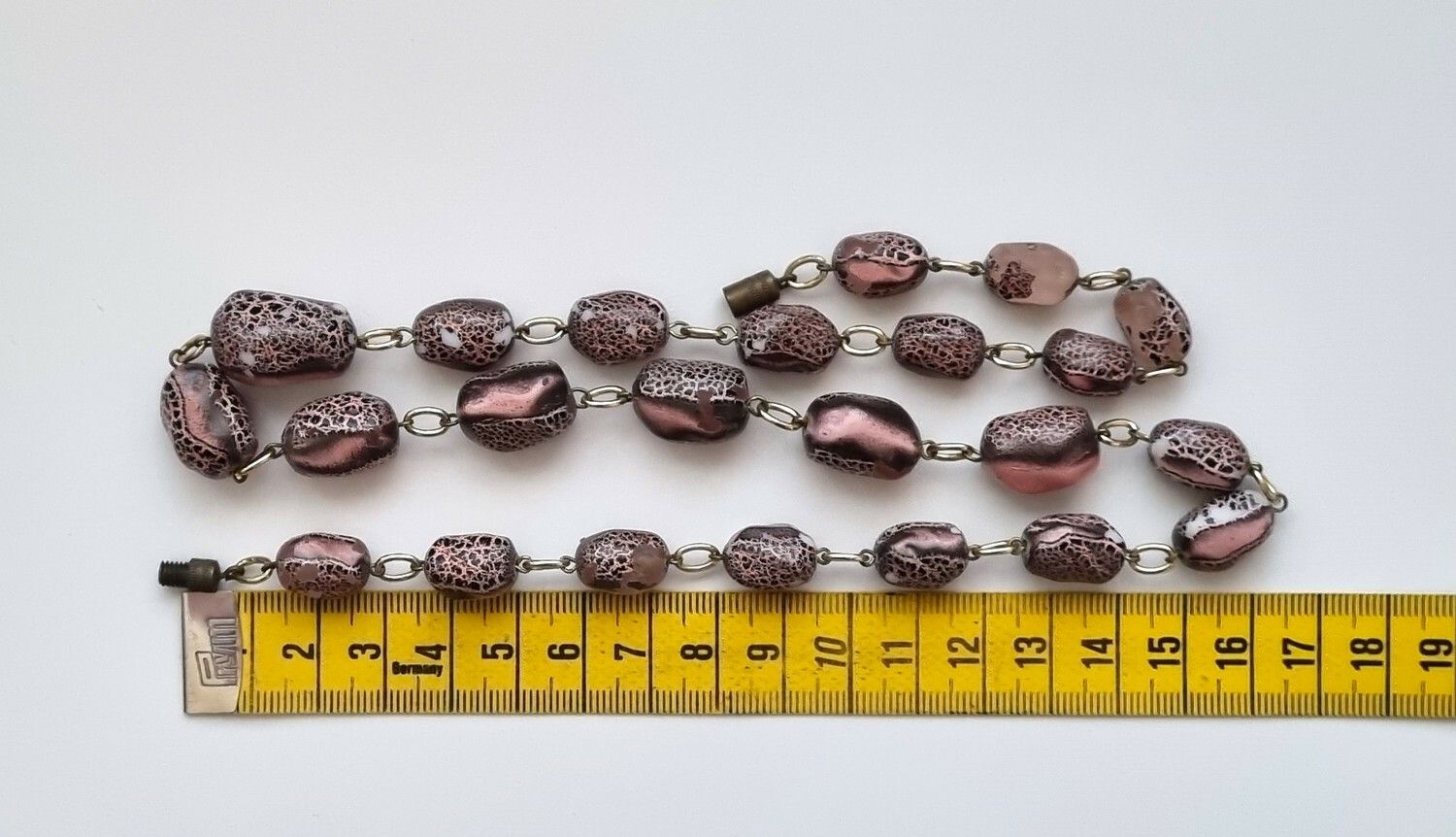 Halsband med rosa/svarta pärlor