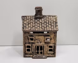 Miniatyrhus, öppningsbart hus i gjutjärn. A.C. Williams (hus nr 116)