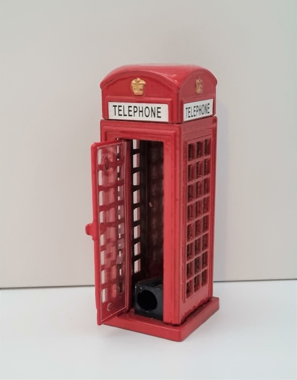 Pennvässare i form av en telefonkiosk