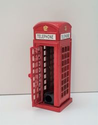 Pennvässare i form av en telefonkiosk