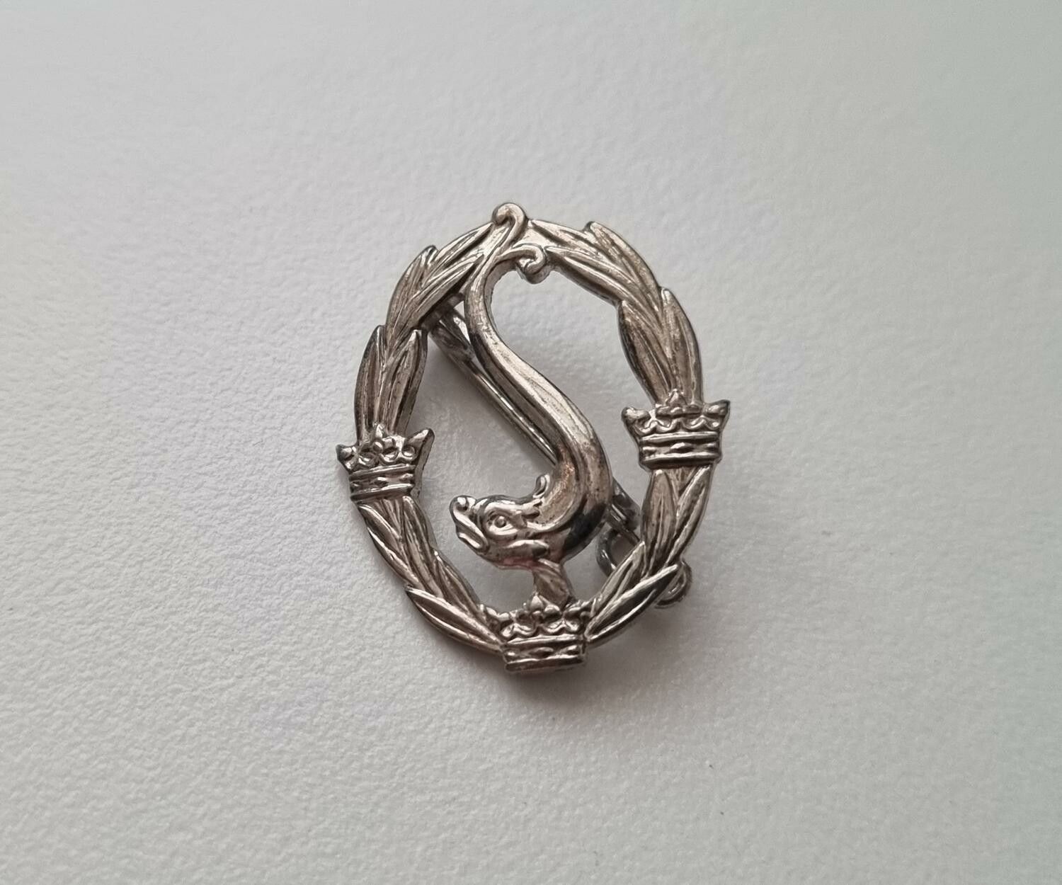Simmärke Silvermärket. Pin / nålmärke