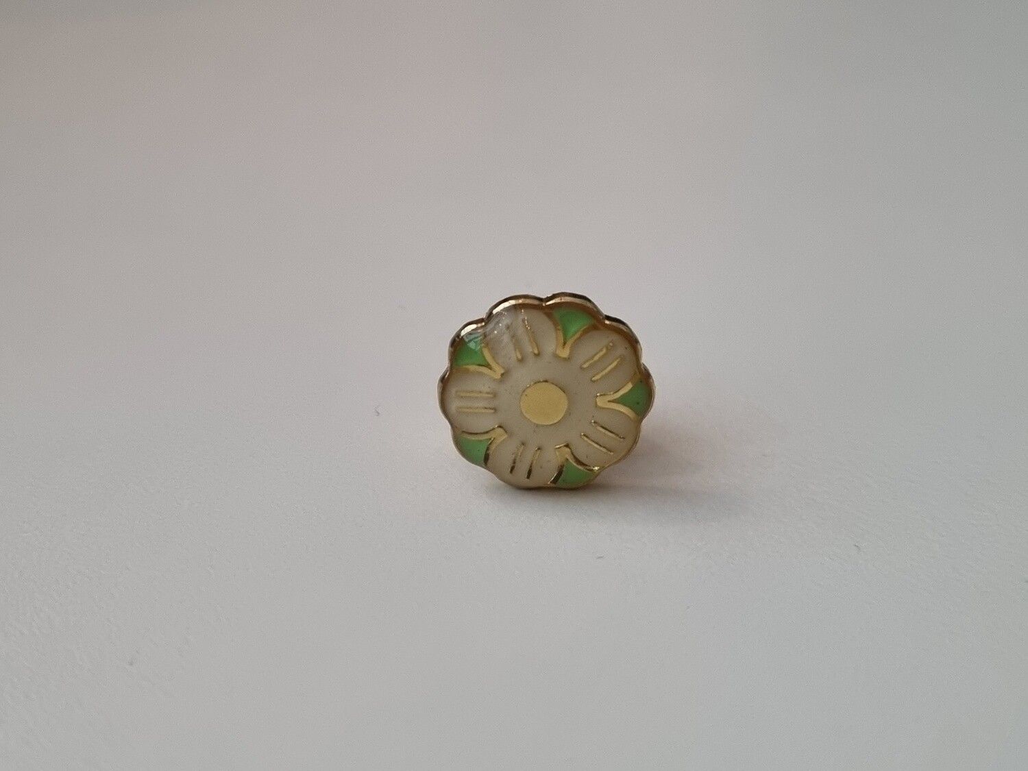 Pin grön blomma