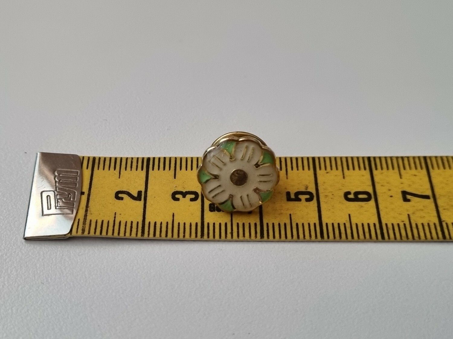 Pin grön blomma