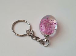 Nyckelring med oval glasberlock (lila)