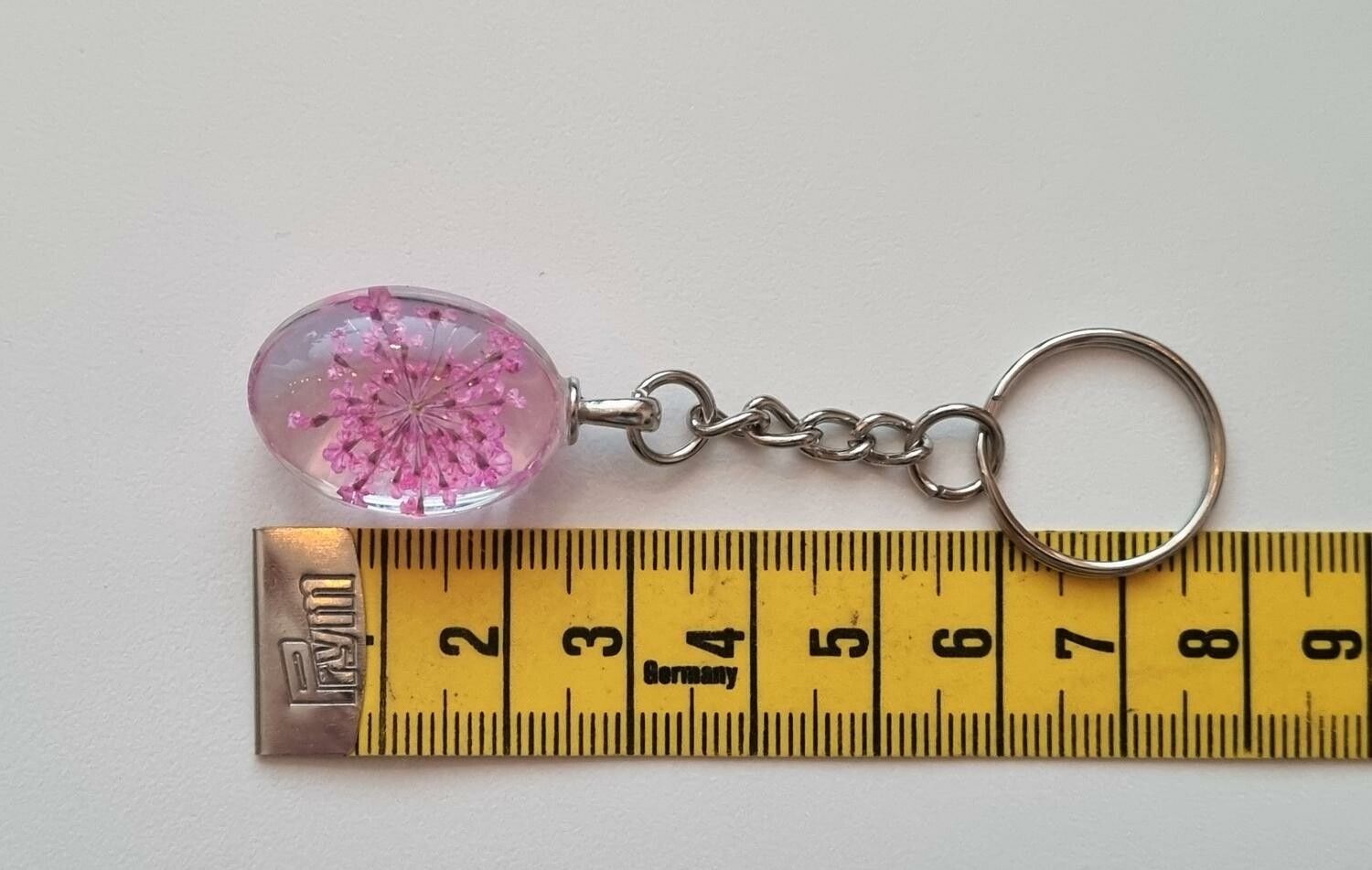 Nyckelring med oval glasberlock (lila)
