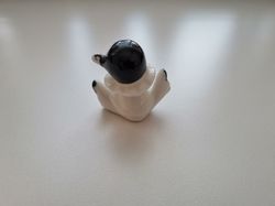 Dam i spagat, miniatyr figurin