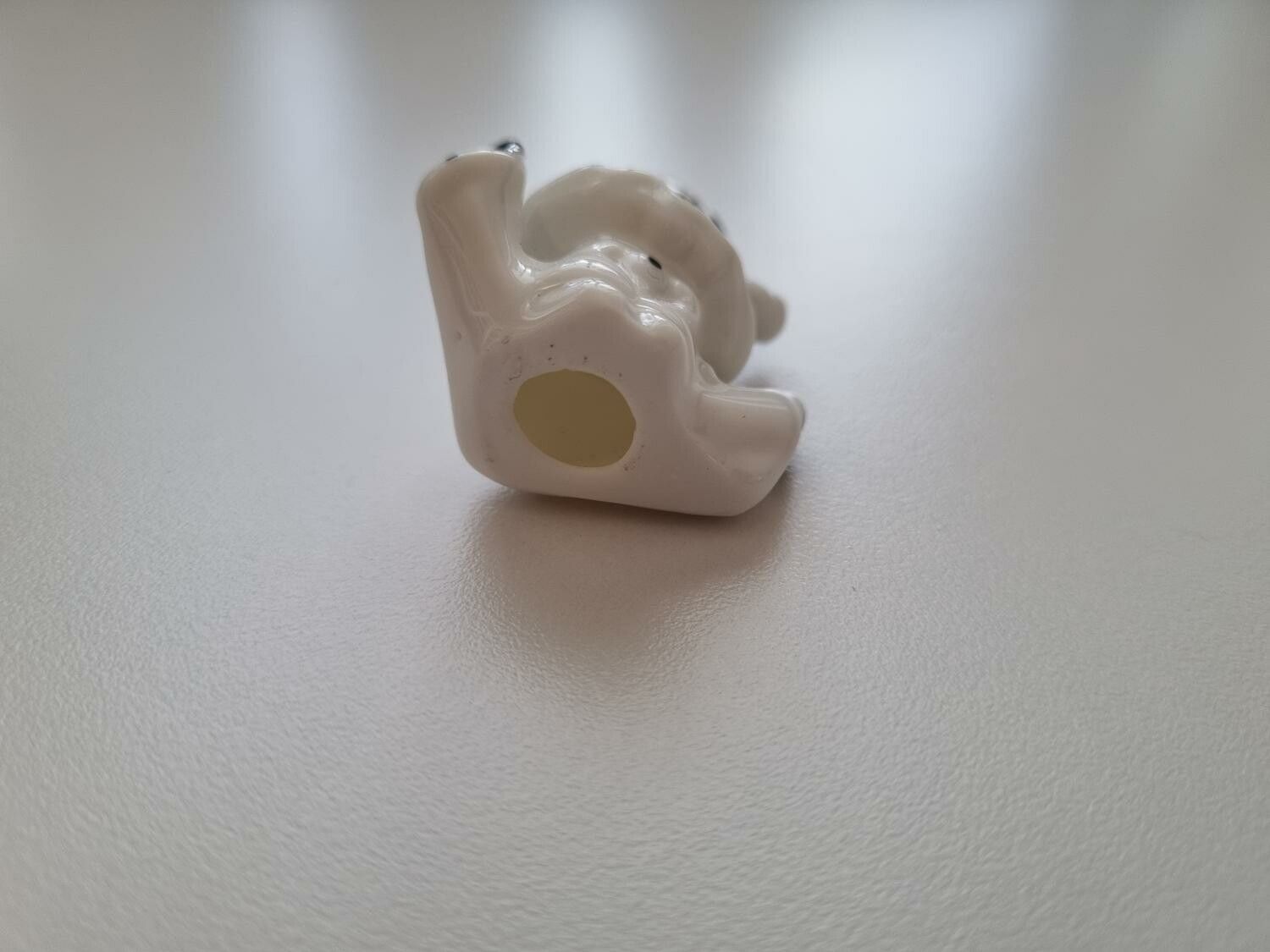 Dam i spagat, miniatyr figurin