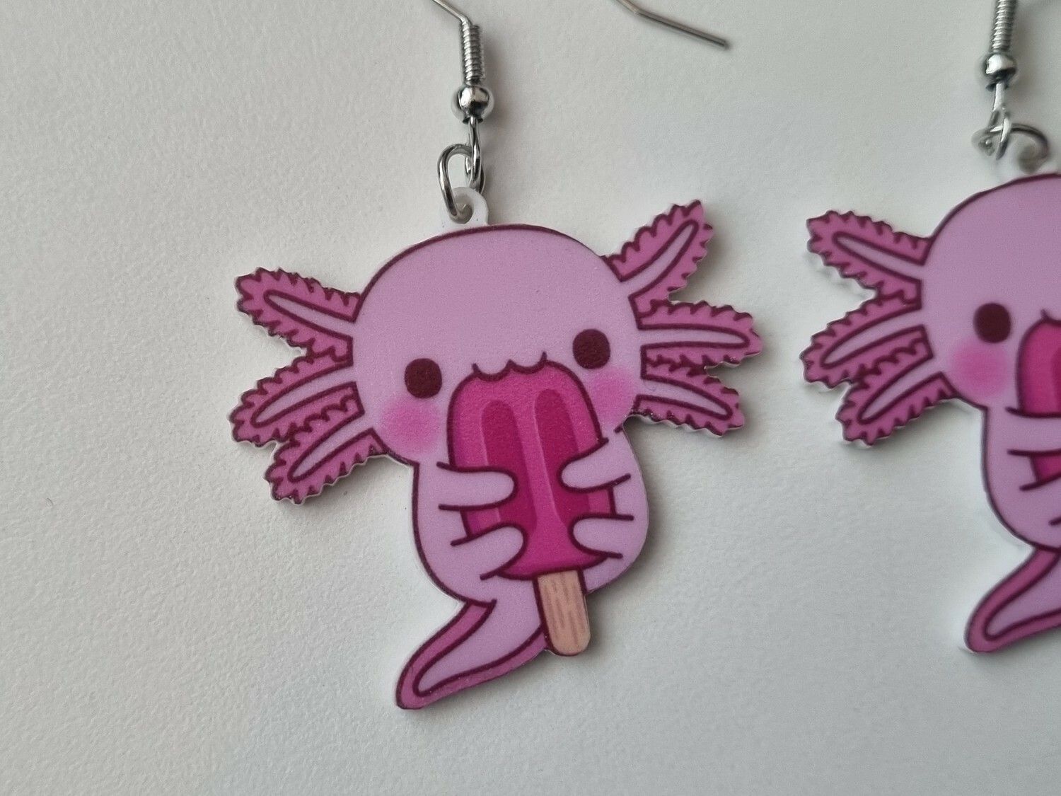 Ett par örhängen, Axolotl med glass
