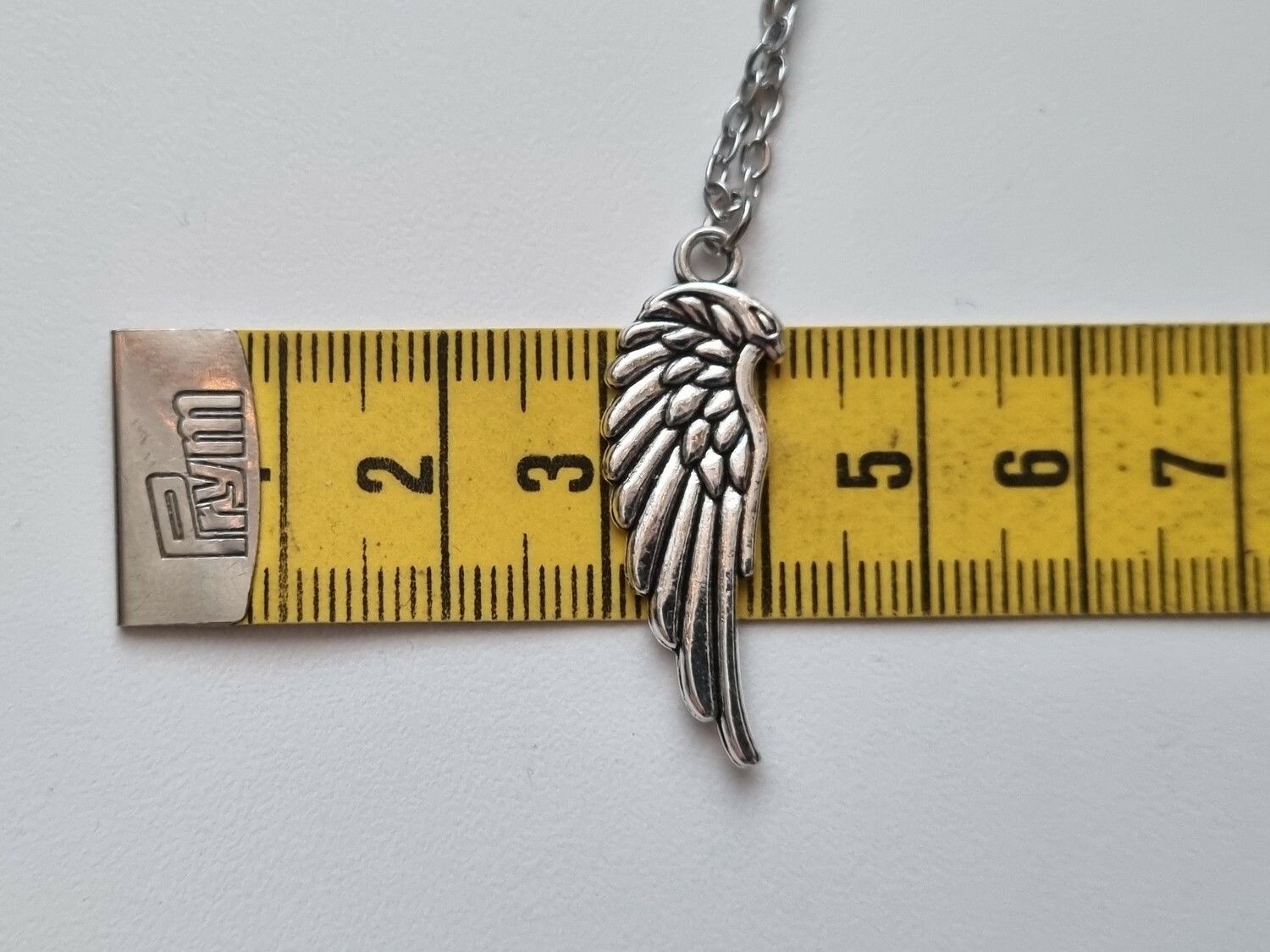 Halsband med fjäder / fjäderberlock
