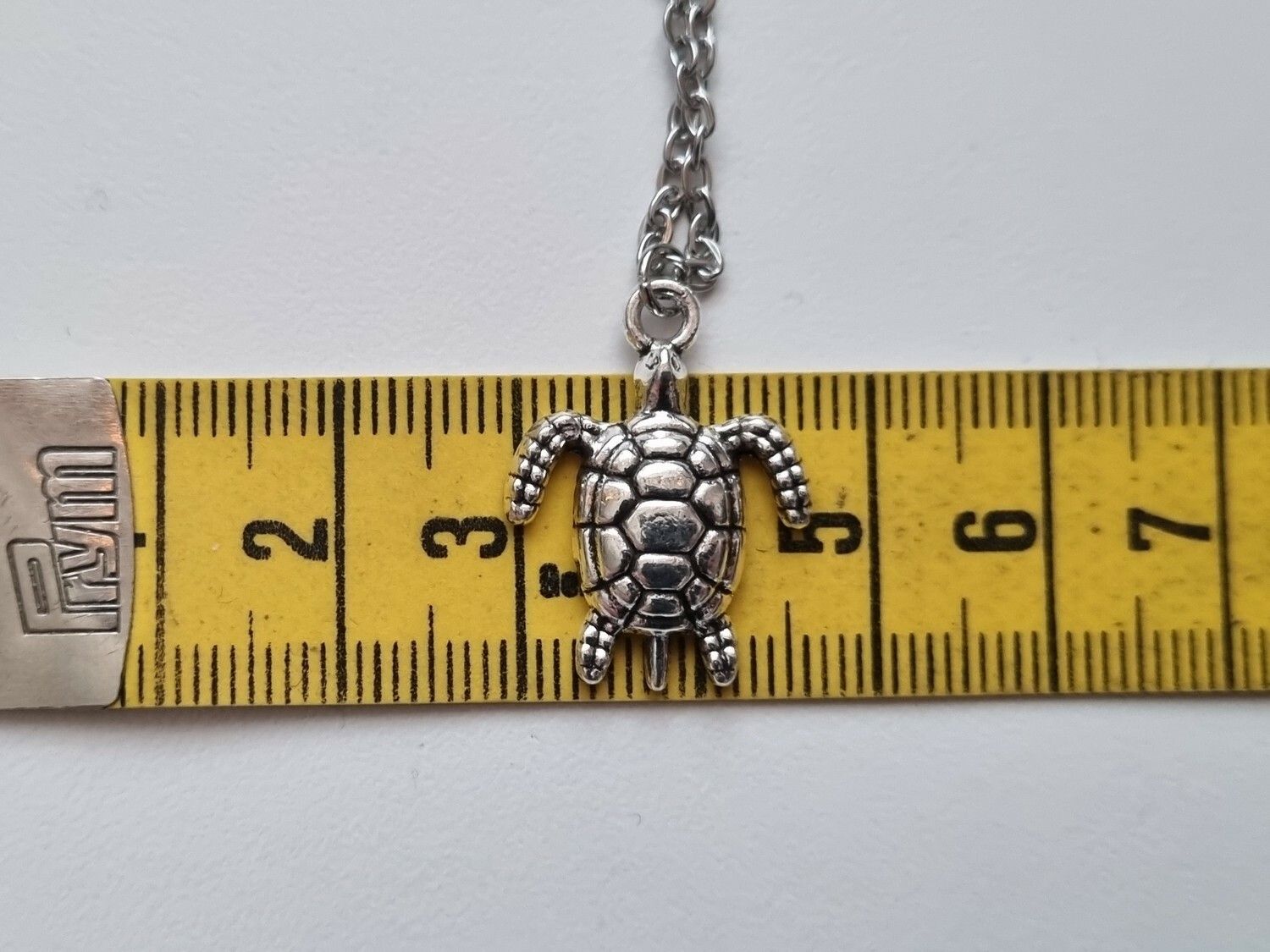 Halsband med sköldpadda