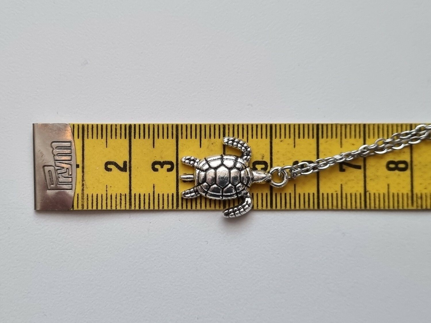 Halsband med sköldpadda