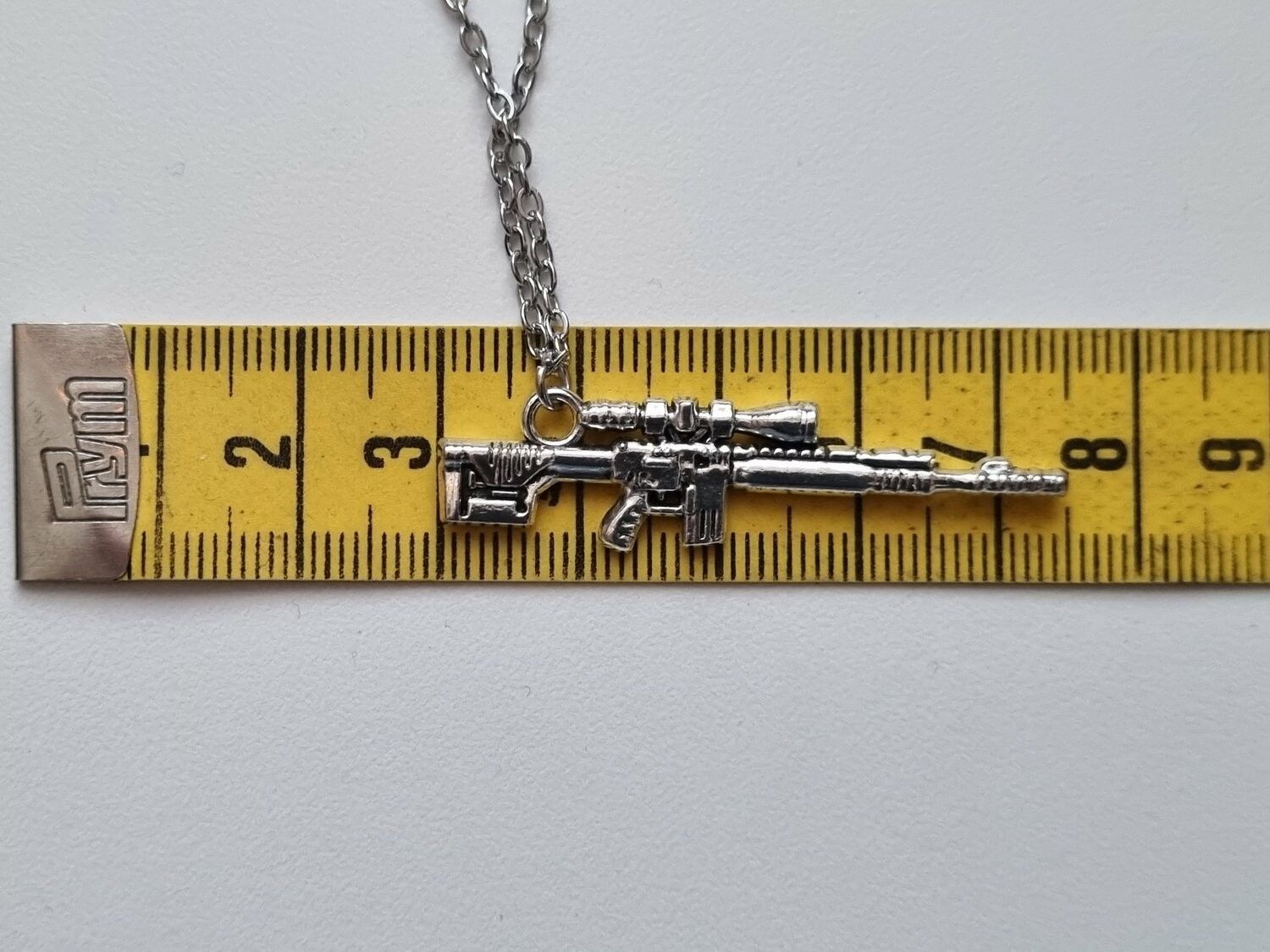 Halsband med gevär