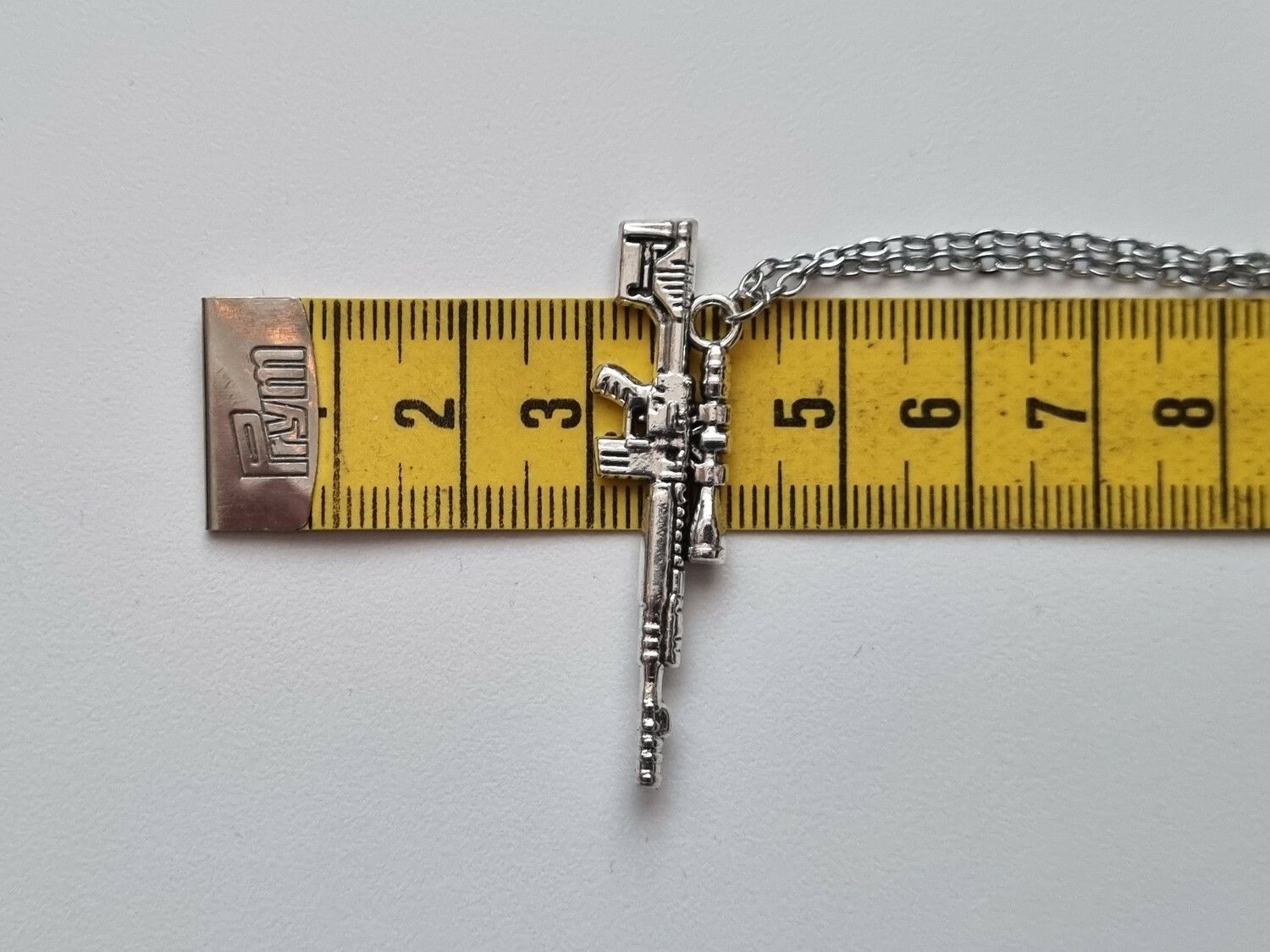 Halsband med gevär