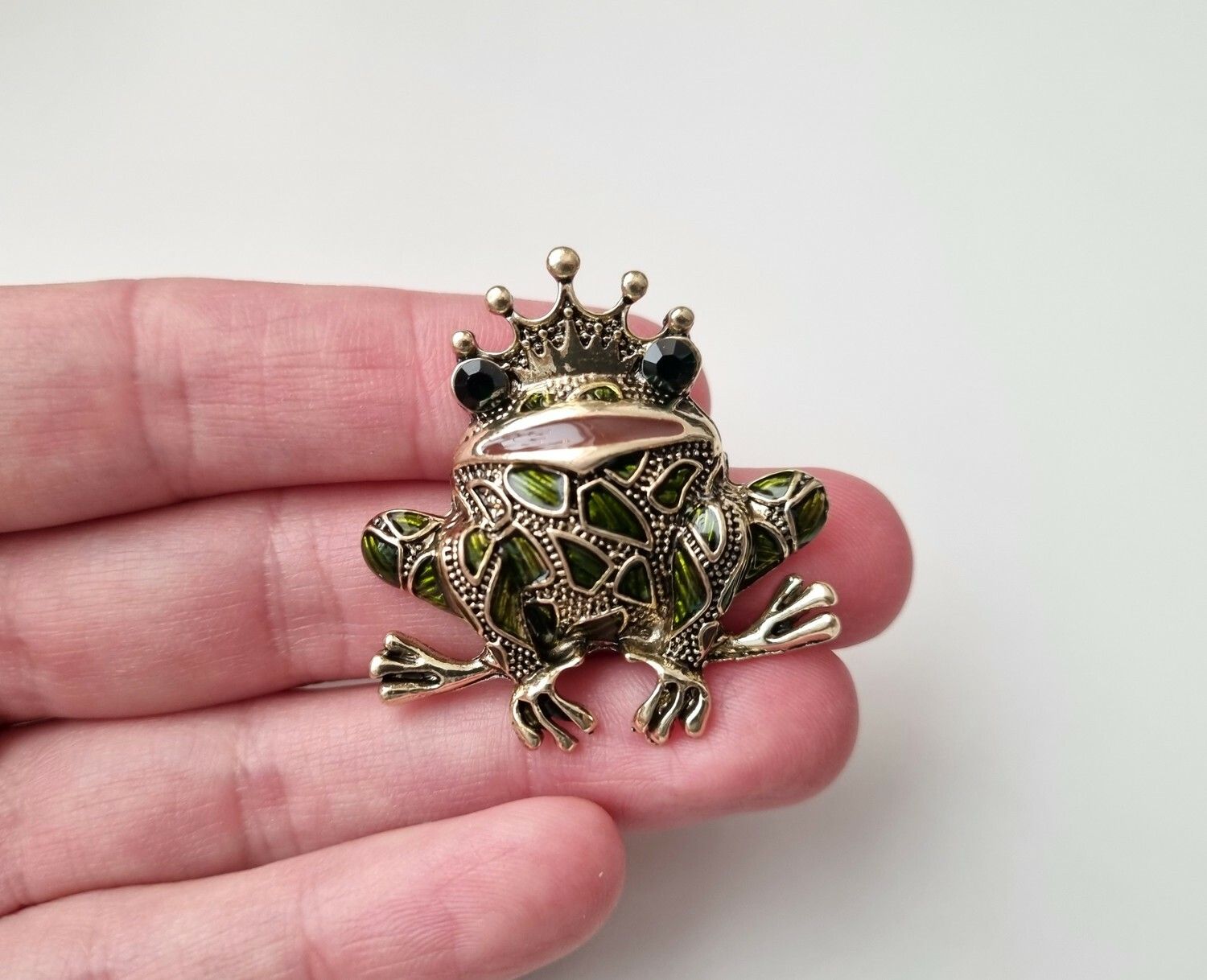 Brosch Groda med kungakrona