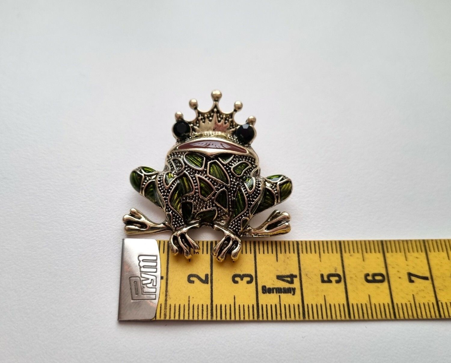 Brosch Groda med kungakrona
