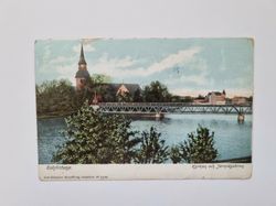 Vykort Eskilstuna. Kyrkan och Järnvägsbron, 1922