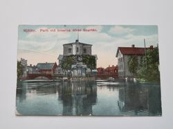 Vykort Mjölby. Parti vid broarna öfver Svartån, 1912