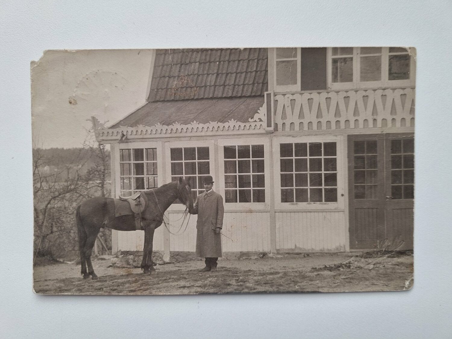 Vykort, fotovykort, man vid häst 1912
