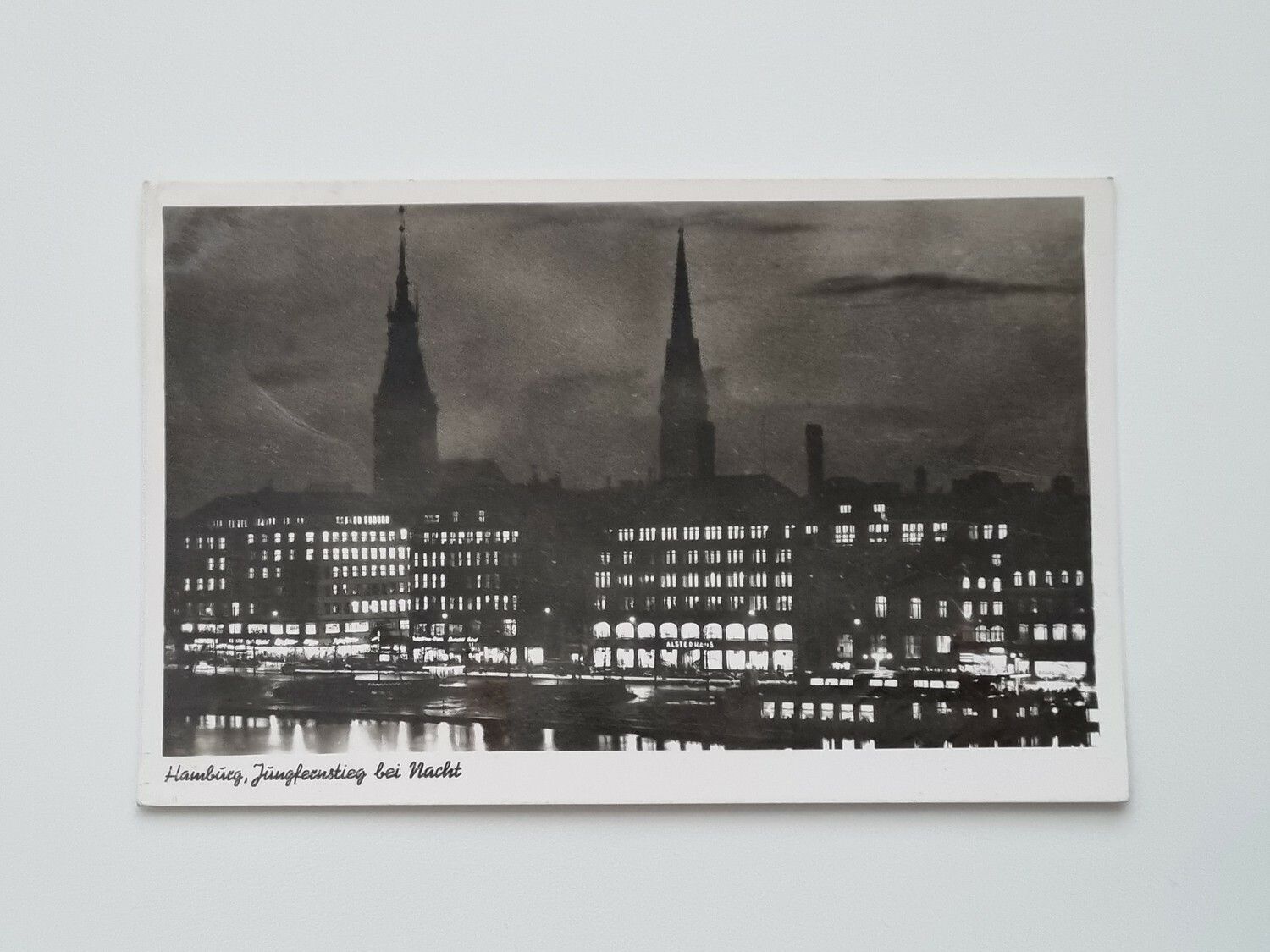 Äldre vykort Hamburg, Jungfernstieg bei Nacht