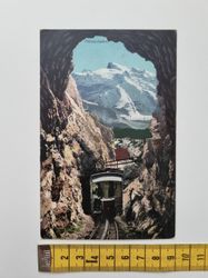Äldre vykort Pilatusbahn. Tunnel mit Blick auf den Titlis.