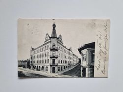 Vykort Södertälje. Storgatan med affärshus
