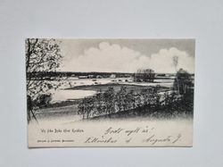 Vykort Wy från Byås öfver Kyrkbyn, 1903?