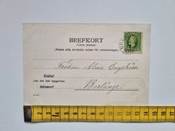 Vykort Wy från Byås öfver Kyrkbyn, 1903?