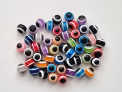 50 st pärlor, spacer beads, ögon i varierande vackra färger (8 mm)