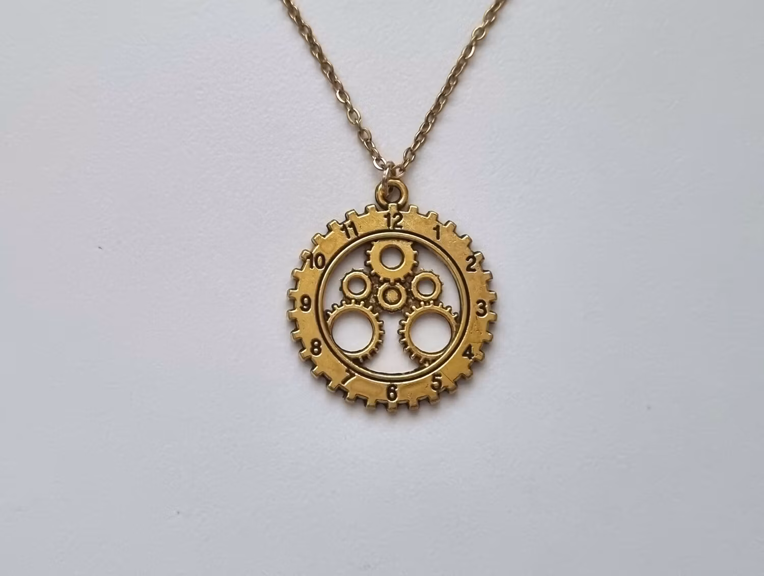 Halsband Klocka, kugghjulsklocka
