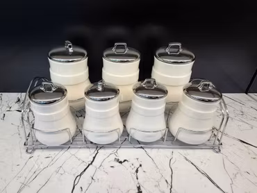 Sett med 7 porselen krukker - Sølv