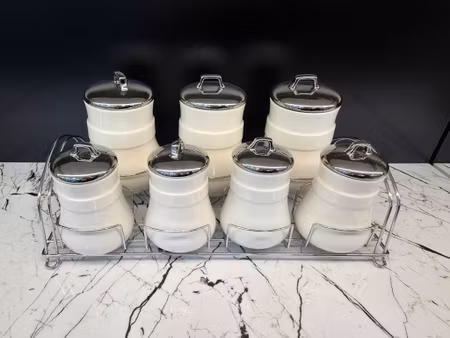 Sett med 7 porselen krukker - Sølv