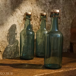 Gamla turkosa glasflaskor