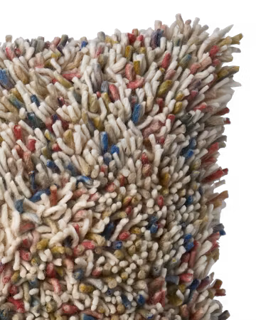 Handgjort kuddfodral av bomull och ull