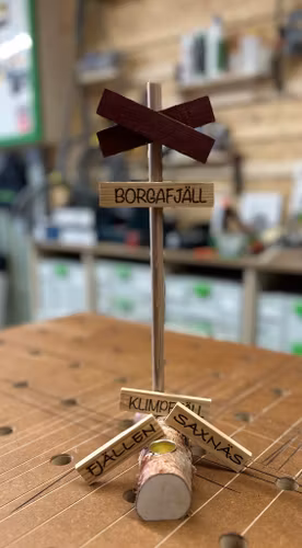 Ledkryss med ljushållare