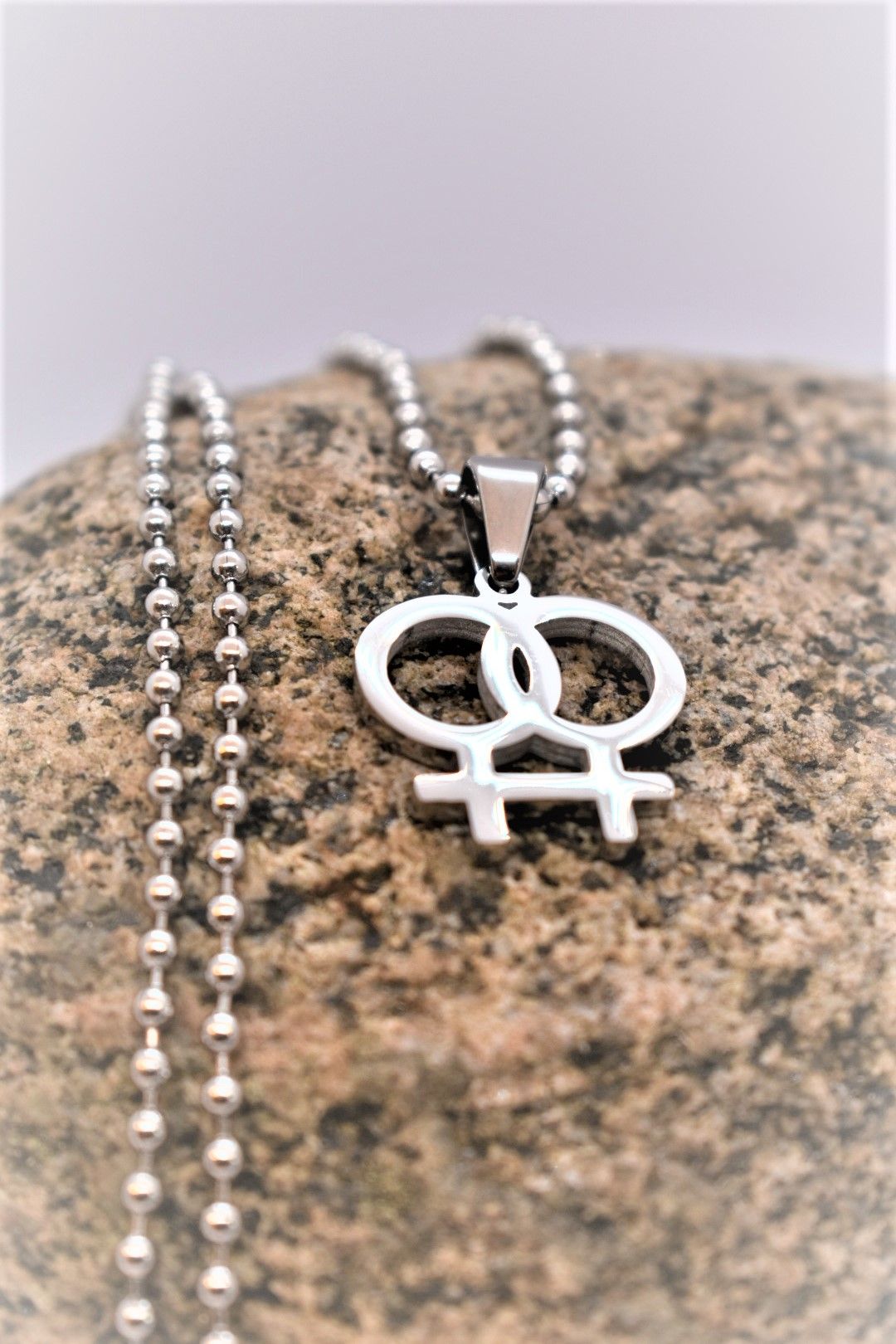 Halsband kvinnosymboler