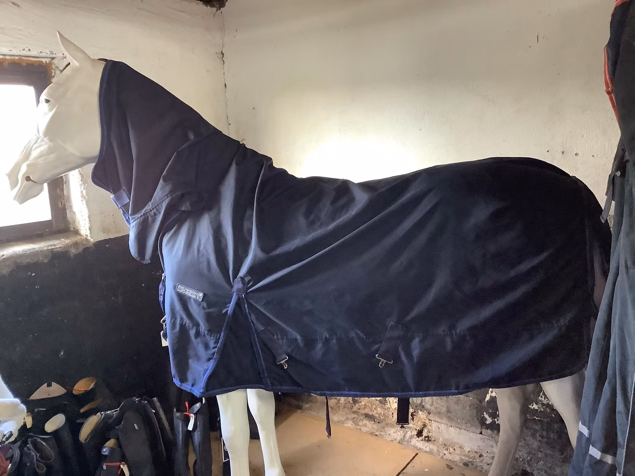 Loveson regntäcke,blått, 115 cm,fattas ett knäppe vid halsen