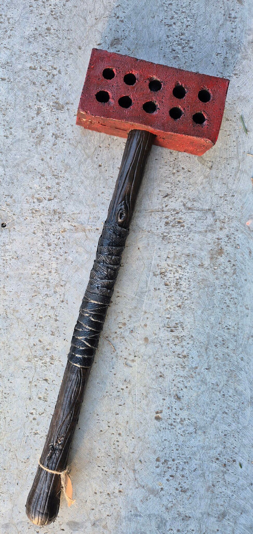 Brick on a stick