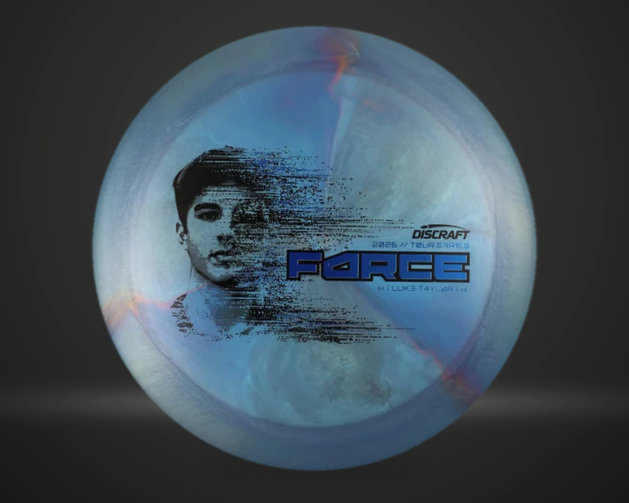 Ti Big Z Force Luke Taylor 2026 distance driver i assortert farge, vist forfra på mørk produktbakgrunn