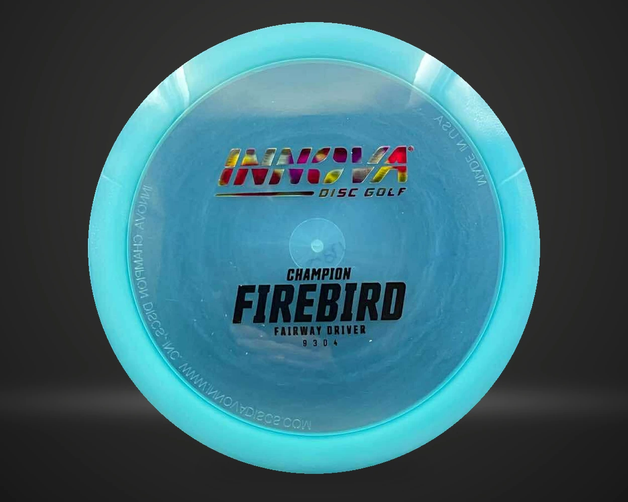 Innova Champion Firebird fairway driver i rosa, vist forfra på mørk produktbakgrunn