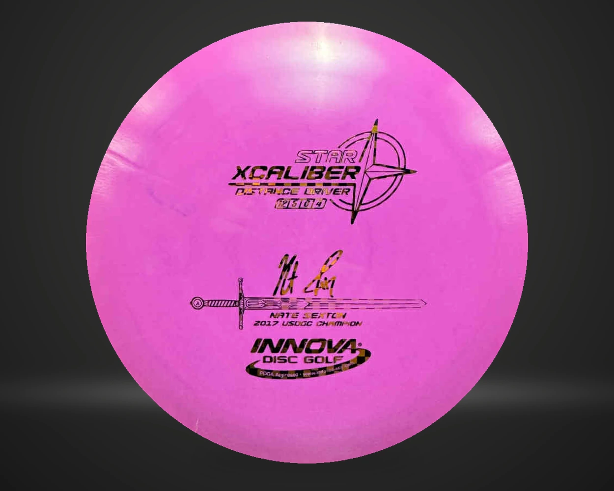 Star Xcaliber distance driver i lilla, vist forfra på mørk produktbakgrunn