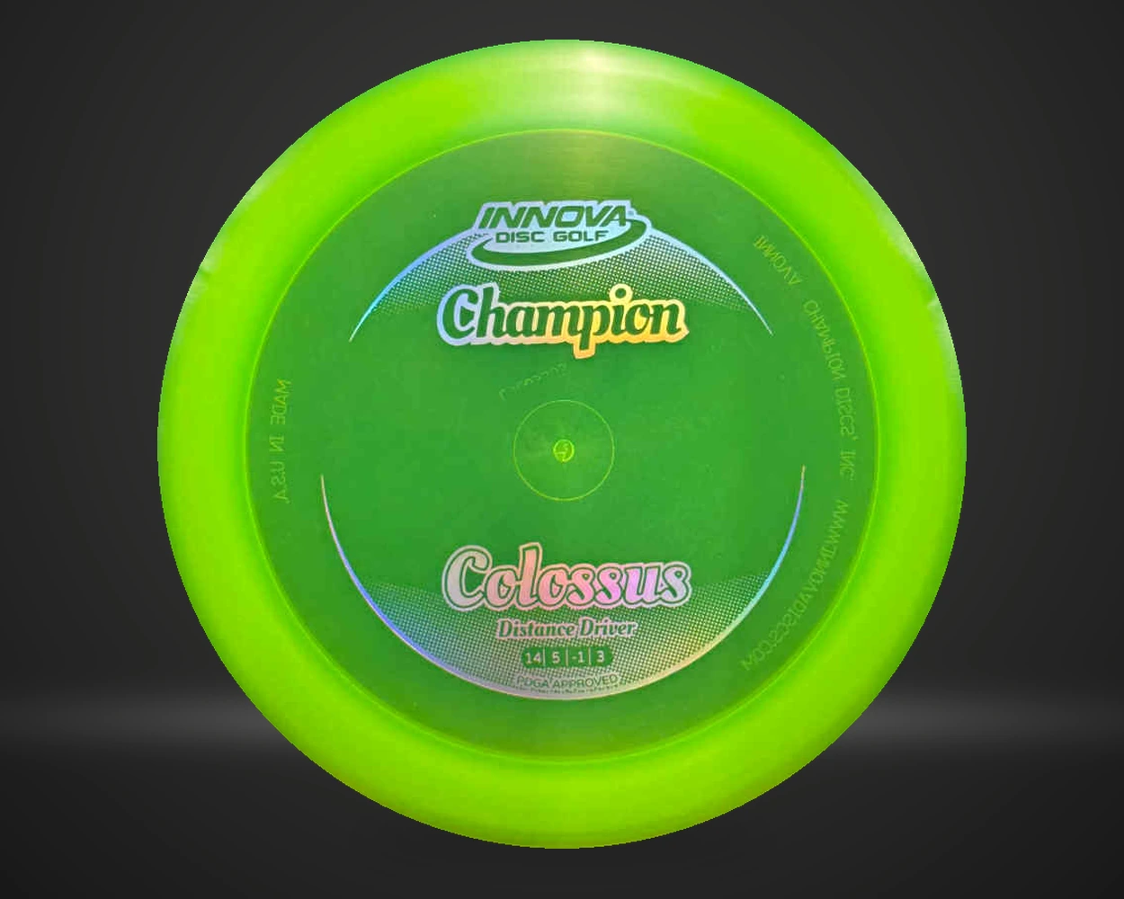 Innova Champion Colossus distance driver i grønn, vist forfra på mørk produktbakgrunn