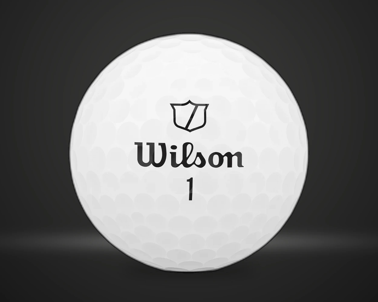 Wilson Staff Model 12 golfballer, detaljbilde på mørk produktbakgrunn