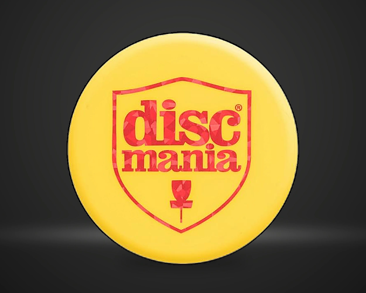 Mini marker for discgolf i gul, vist forfra på mørk produktbakgrunn