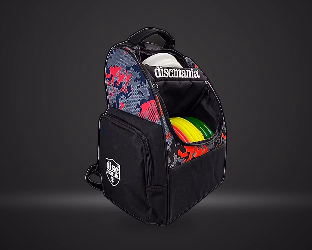Discmania Fanatic Fly Backpack discgolfsekk i miami-farge, vist forfra på mørk produktbakgrunn