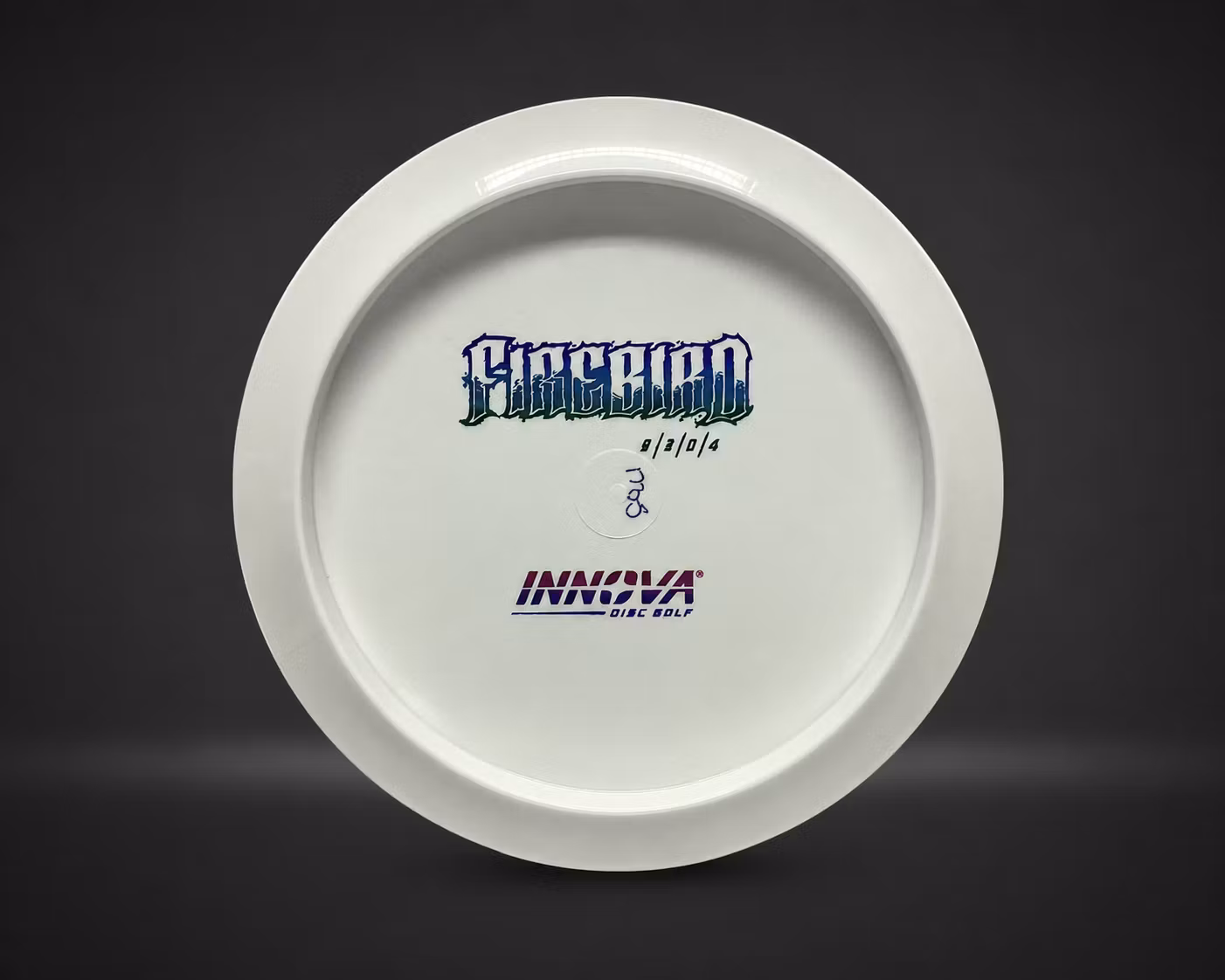 Innova Star Firebird Bottom Stamp fairwaydriver, vist på mørk produktbakgrunn