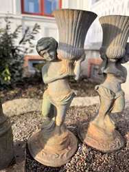 Trädgårdsurnor putto