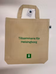 Beige tygkasse med kort handtag