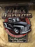 Plåtskylt Dads garage